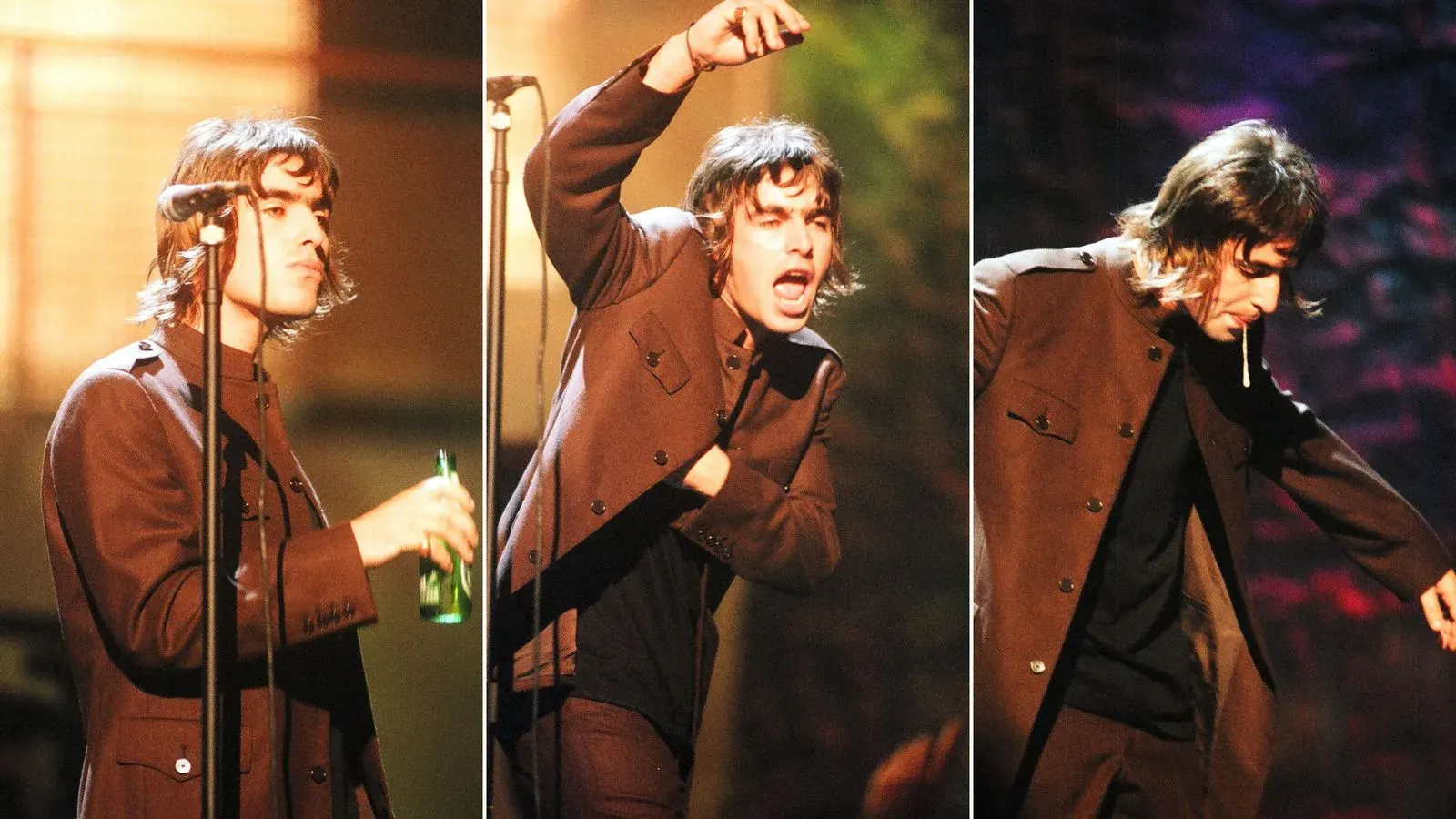 ليام غالاغر يؤدي على المسرح في عرض لفرقة أويسس، مع تعبيرات حماسية، بينما يحمل زجاجة مشروب، في أجواء موسيقية مشحونة.