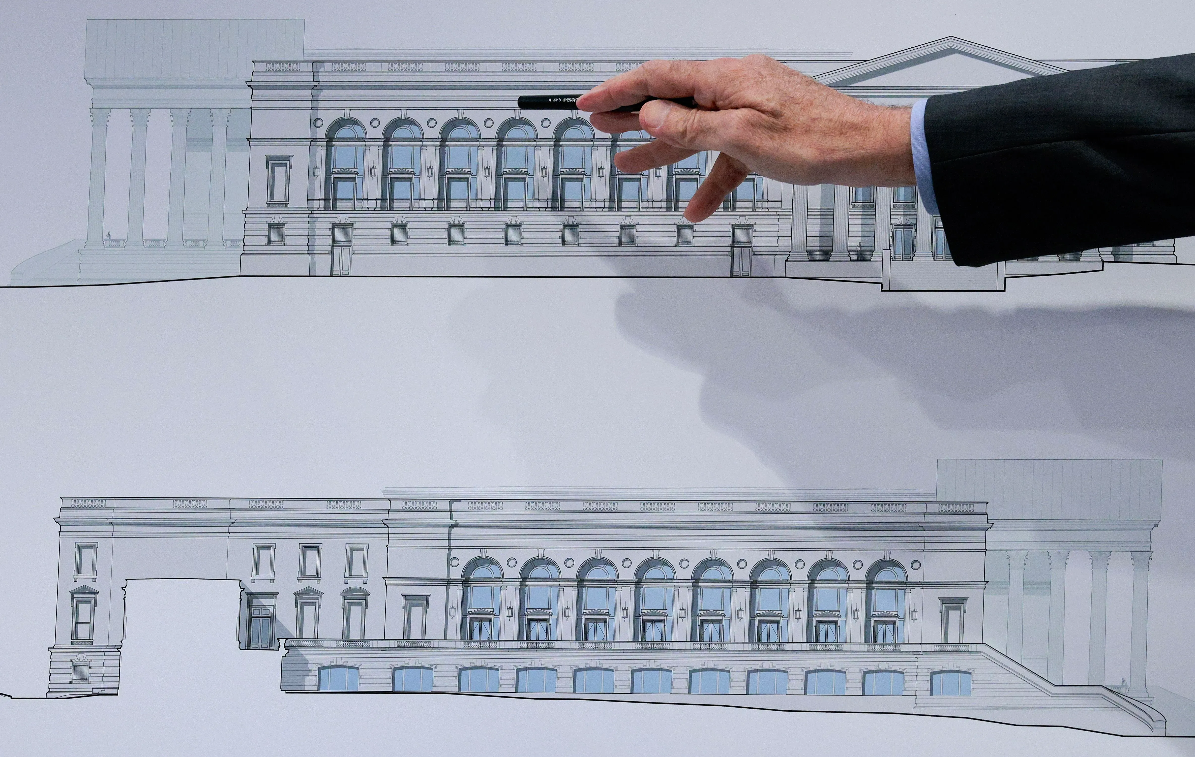 تصميم مقترح لقاعة الرئيس ترامب، مع يد تشير إلى التفاصيل المعمارية، وسط مخاوف عامة من حجم المشروع وتأثيره على البيت الأبيض.