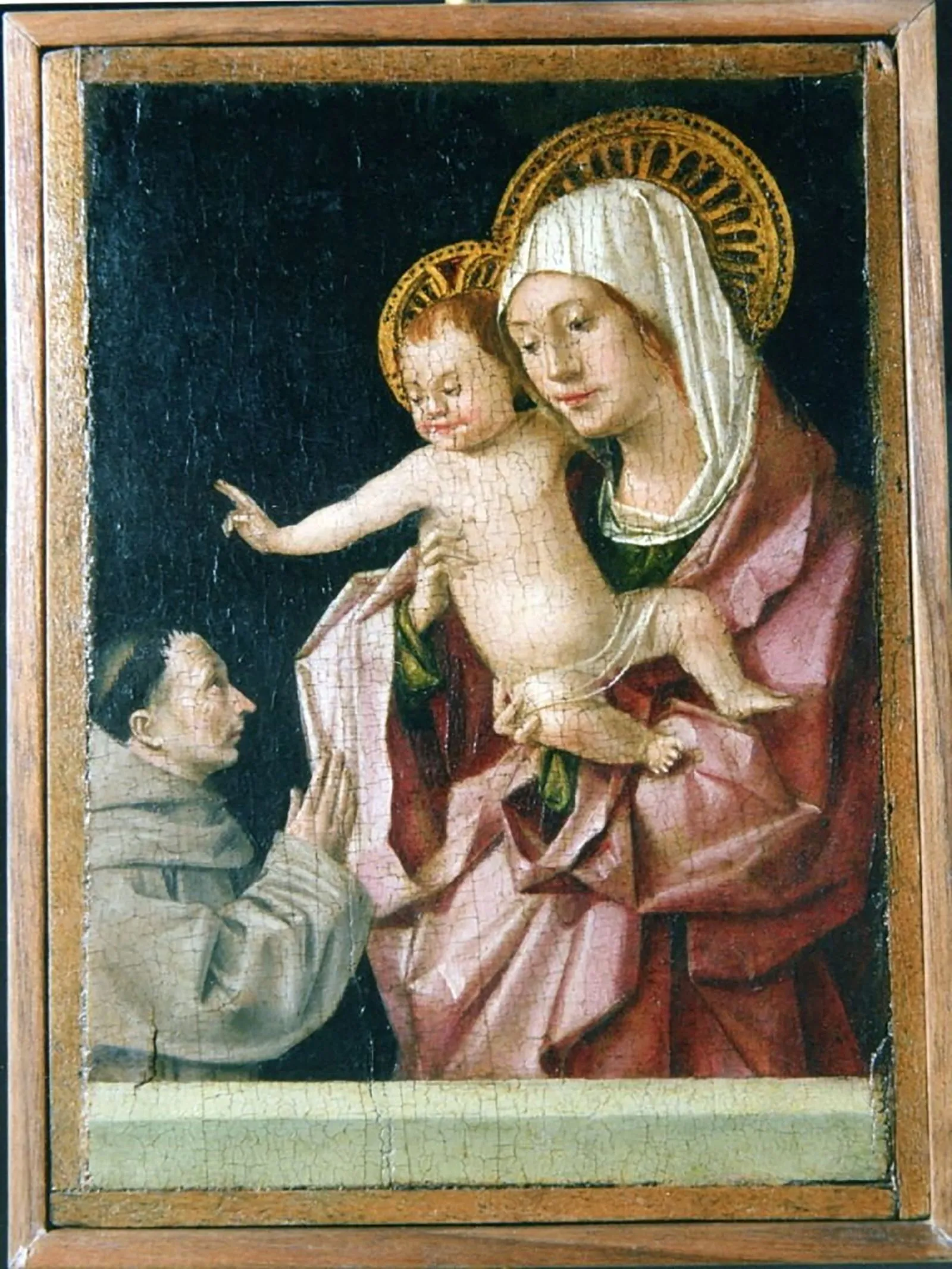 لوحة فنية لـ Antonello da Messina تظهر العذراء والمسيح الطفل مع راهب، من أعمال النهضة المسروقة من متحف MuMe في ميسينا بالصقلية.