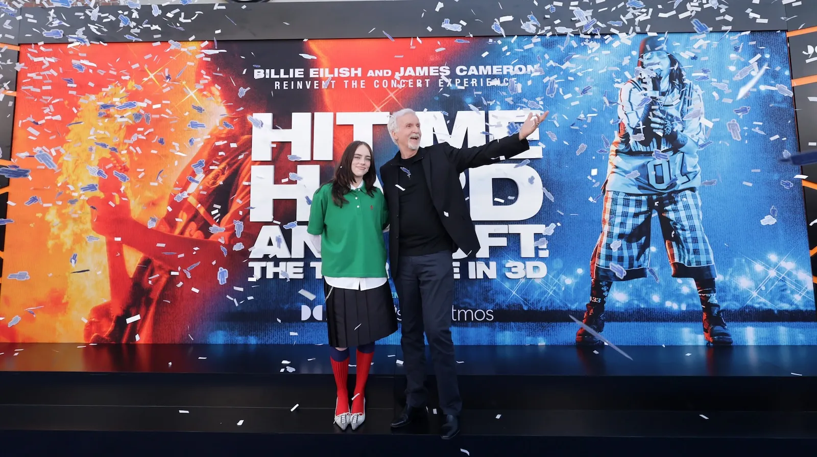 بيلي إيليش وجيمس كاميرون يحتفلان بإطلاق عرض "Hit Me Harder" في حدث موسيقي بتقنية 3D وسط زخات من الورق الملون.